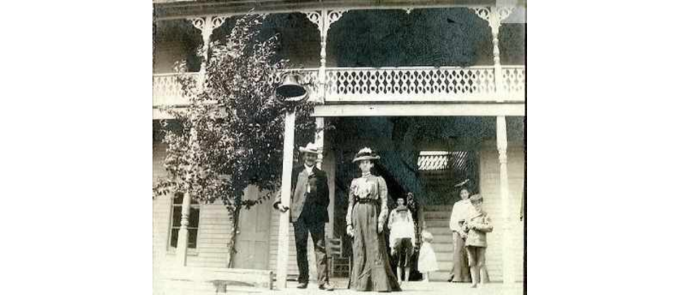 C.C. and Isabelle Draper Stone,  in front of the hotel they ran. Children are behind them. Image courtesy of Madeline Stone Gilbert